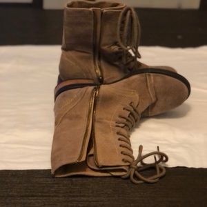 Women's brown suede combat boots.